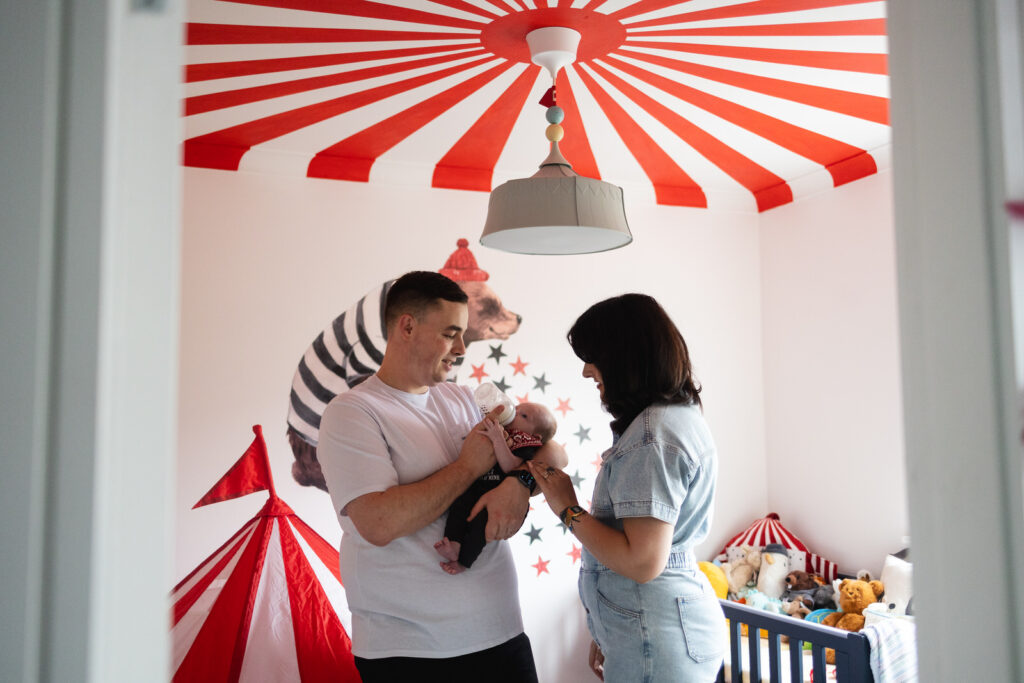 In-home newborn photography session in Dublin with baby and parents